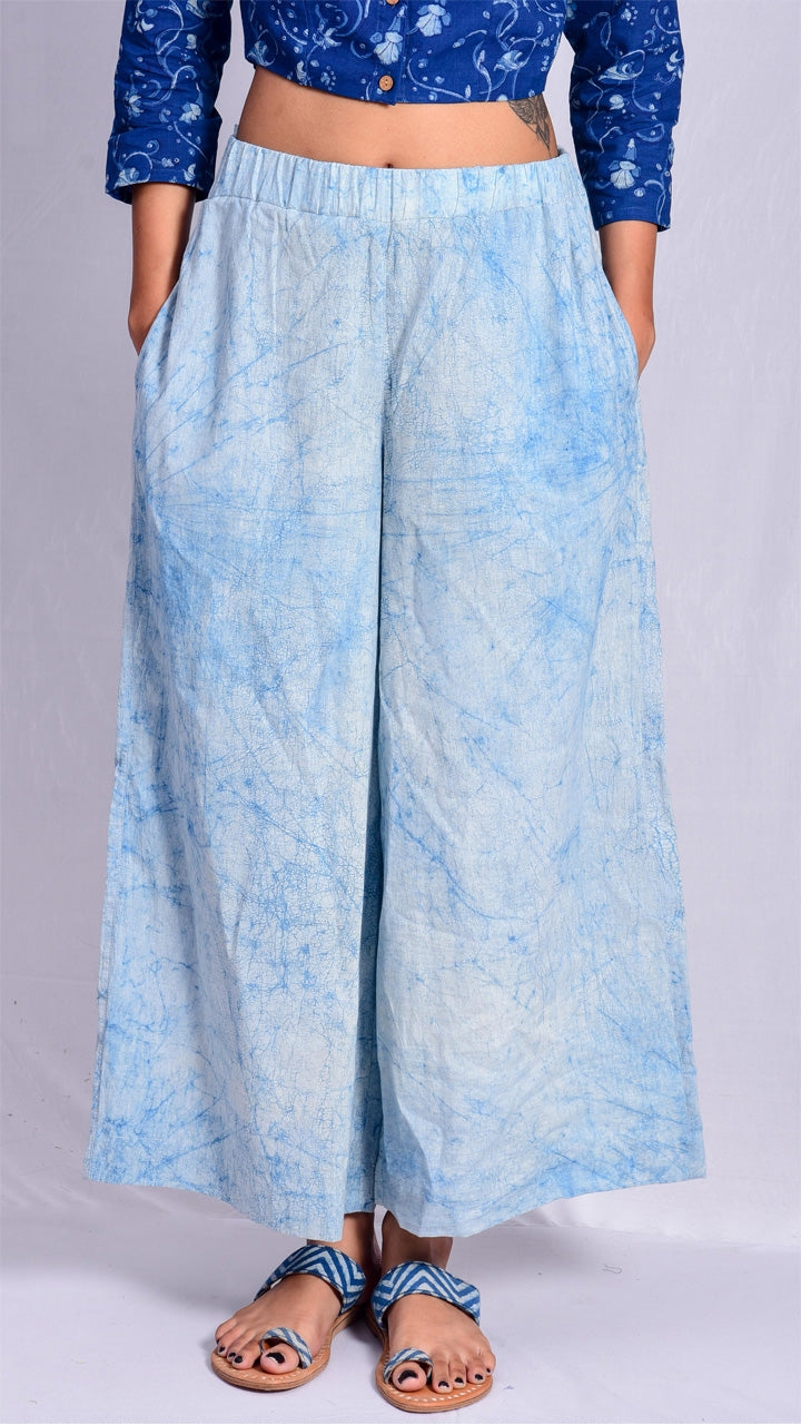Off white and blue floral printed palazzo by Pants and Pajamas  The Secret  Label